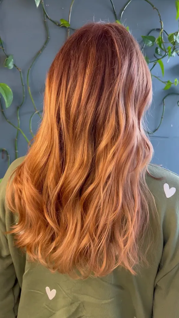 Long, glossy copper hair
