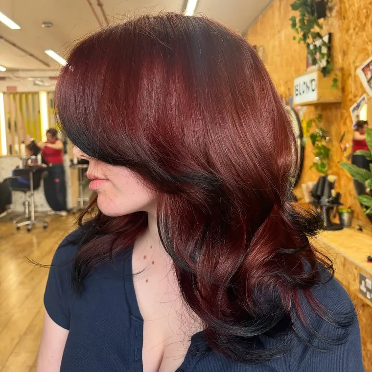 Copper 'fox tips' worked through dark hair at HIVE Hair Salon