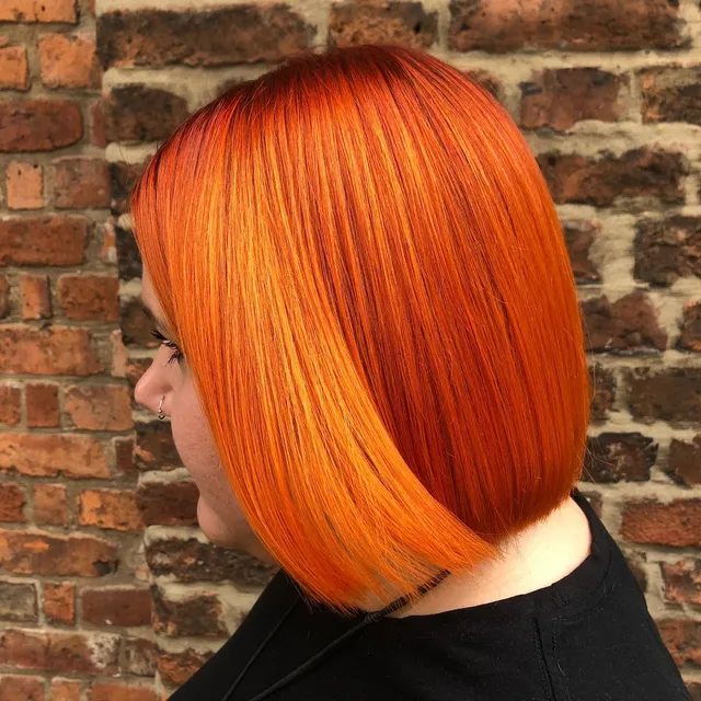 Vivid copper-orange sliced bob